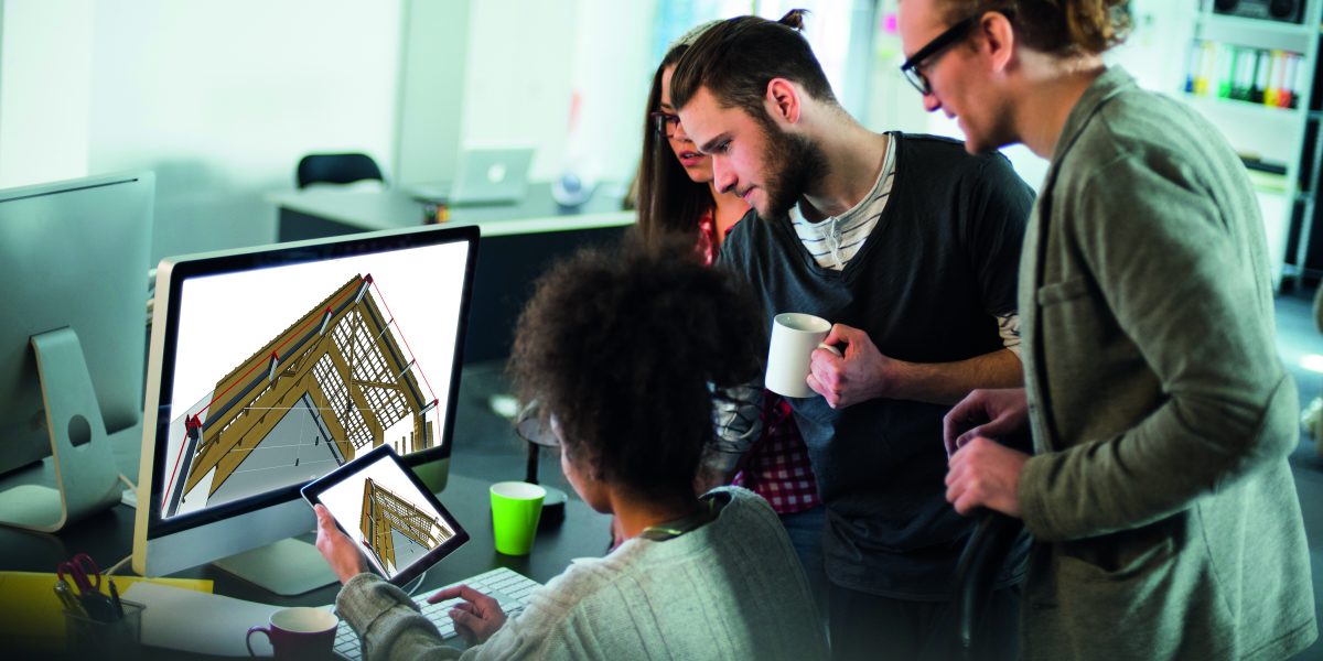 Group of young architects working in office